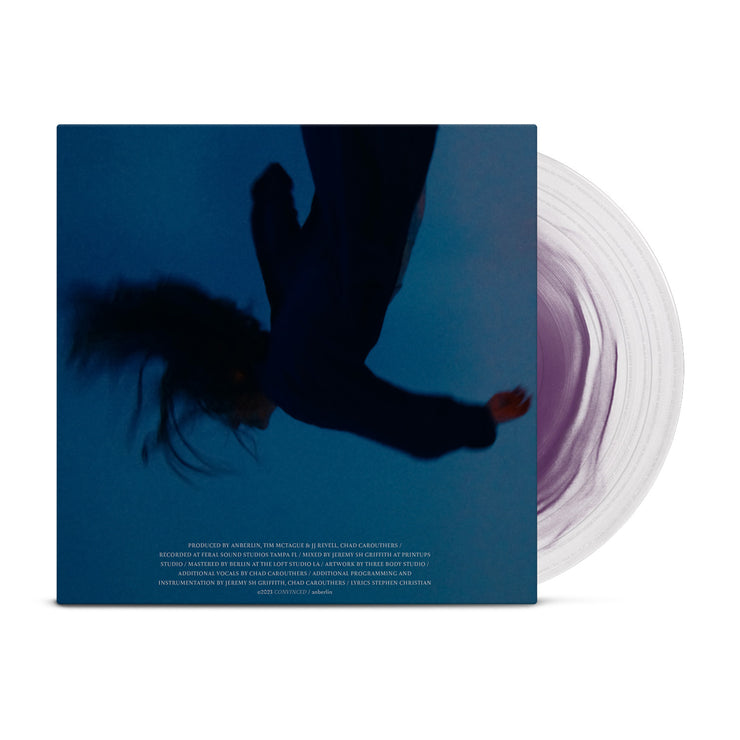 Anberlin "Convinced" vinyl. Cover is a blue picture with a black, upside down figure falling. Vinyl is clear and purple.