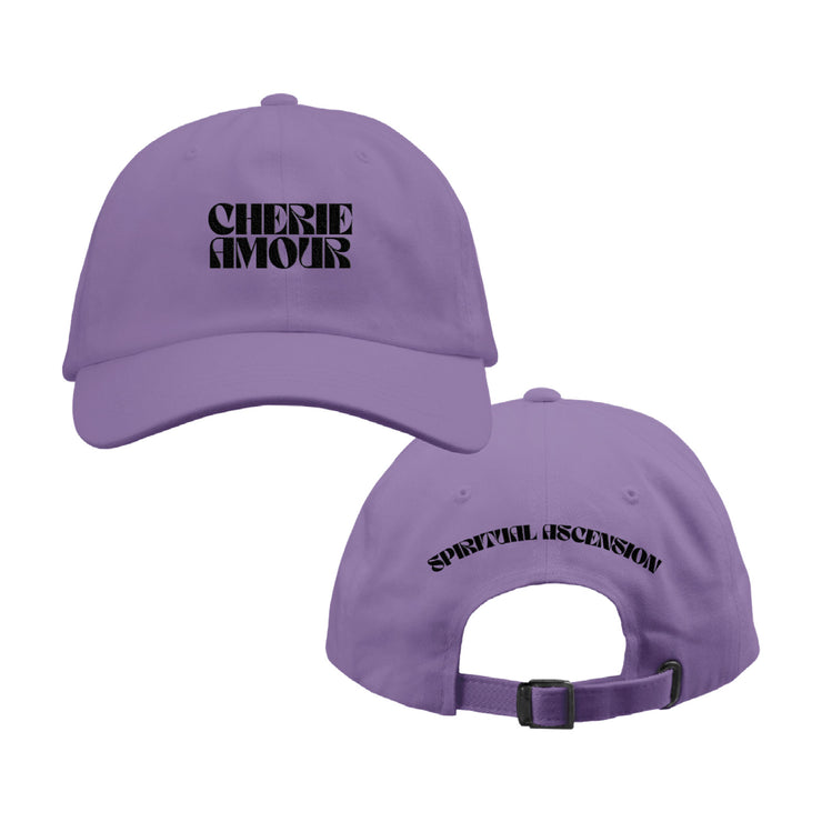 Lavender colored baseball hat. On the front of the hat reads CHERIE AMOUR in Black letters.  On the back of the hat, it reads SPIRITUAL ASCENSION in smaller black letters.