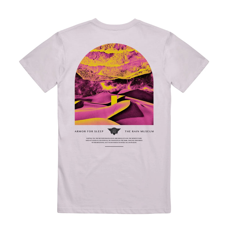The back of the shirt is artwork of a desert shaded in yellow and pink. Below the artwork there is text that says ARMOR FOR SLEEP and THE RAIN MUSEUM.