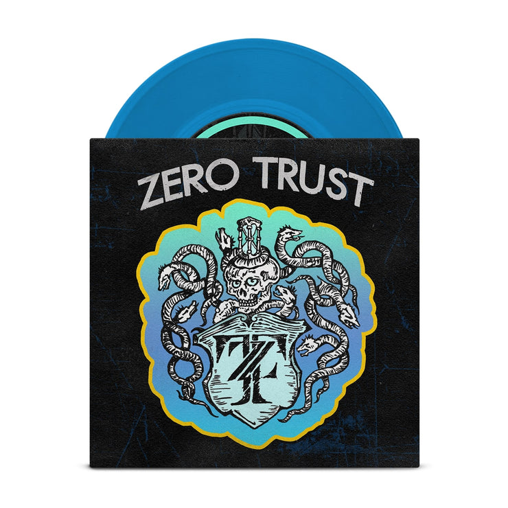 Black vinyl jacket with ZERO TRUST written across the top. Below the text is a drawing of a skeleton with snakes surrounding it, drawn in white. Below the skeleton is a crest that has the letters Z and T written inside it. Peeking out of the top of the vinyl jacket is a blue vinyl.