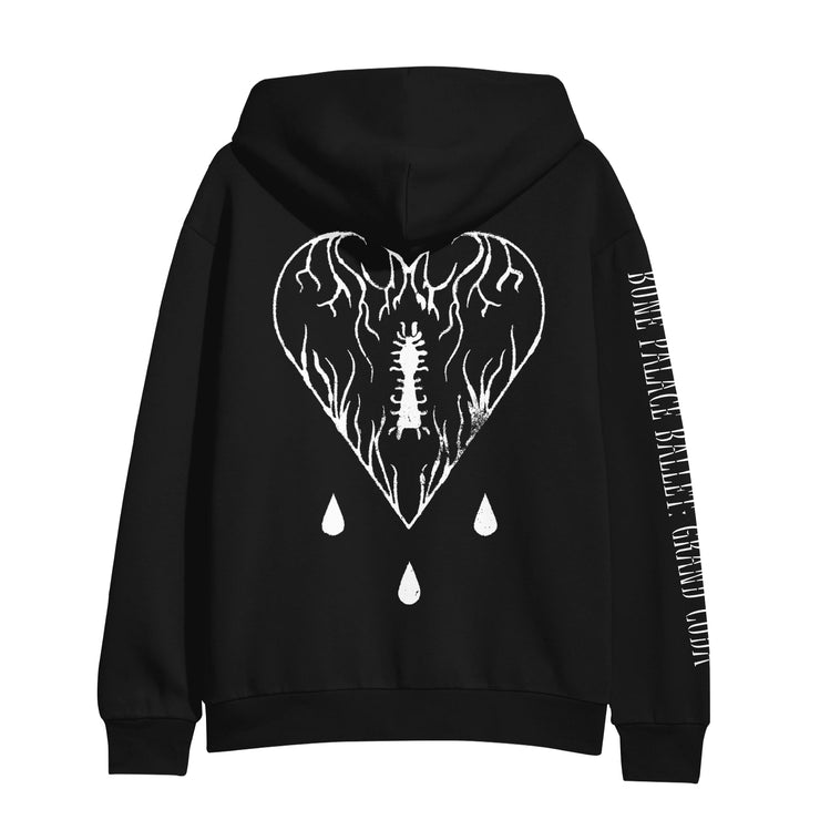 Back of black pullover hoodie. There is a large white heart with veiny lines and an insect inside. Below that is three droplets falling.