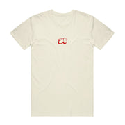 Cream colored t shirt with YC written in the middle of the shirt in small red letters.