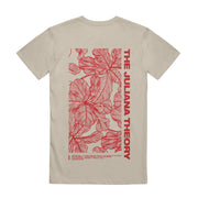 Back of sand colored short sleeve shirt with a large vertical rectangle filled with a red leaves design. To the right of the design is red text that says THE JULIANA THEORY.