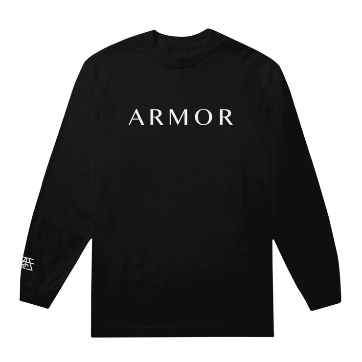 The color of this long sleeve shirt is black.  The front of this shirt reads ARMOR in white letters.   On the right side of the shirt reads ARMOR FOR SLEEP in white letters going down the left side of the shirt.