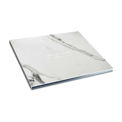 Square CD, white and grey marble design with white lettering writing (this is) heaven.