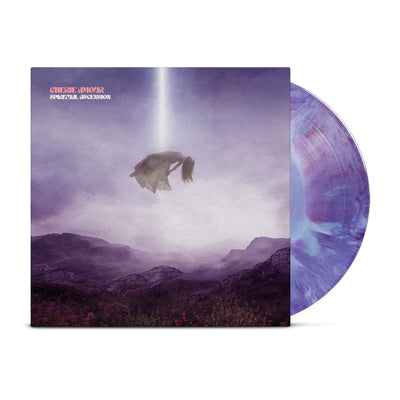 12" vinyl record.  The cover art has painting of mountains and valleys.  There is Purple mist descending from the sky.  In the middle of the cover is a girl in a dress being pulled up towards the sky by white beam of light. In the top left corner reads CHERIE AMOUR in orange letters and below it reads SPIRITUAL ACSENSION in white letters.  The vinyl record is designed in a blue pink and purple tye dye pattern.