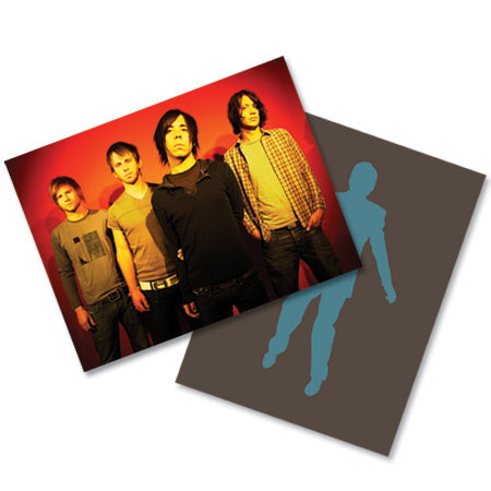 Band members standing four across horizontally in front of a red back drop. The other side of the image is a blue man centered vertically.