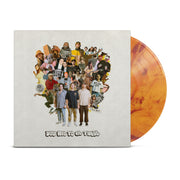 This LP has a white background.  In the middle of the album are a series of pictures of people doing various activities.  these include a man skateboarding, a person playing guitar, and a person playing with a VR console.  Below the series of pictures reads YOU HAD TO BE THERE in black bubble letters. The vinyl is an orange tye dye pattern.