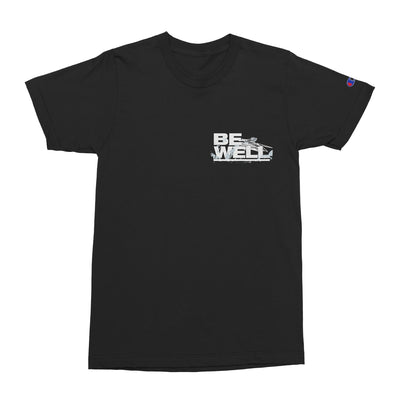 Black short sleeve shirt with white text in the top corner that says BE WELL.
