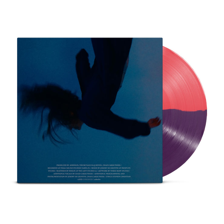 Anberlin "Convinced" vinyl. Cover is blue with a black, upside down figure falling. Vinyl is half opaque purple and half opaque red