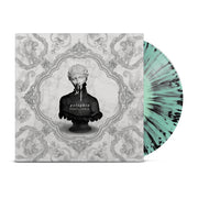 Square vinyl with a white background that depicts elegant architectural engravings. There is a shoulders up statue of a woman in the center of the vinyl. Half of the statue of the woman is colored with a black ink substance.  There is text on the chest of the woman statue that says POLYPHIA and below that text RENAISSANCE. Part of the vinyl is sticking out of the right side of the vinyl showing that the vinyl is a psychedelic black and light blue color.