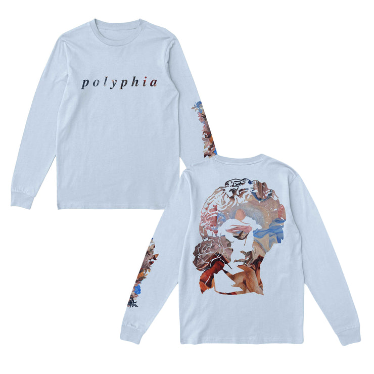 White long sleeve shirt with polyphia written across the chest in black font. On one of the sleeves there is a colorful flower design. The back of the shirt is a drawing of a renaissance statue of a woman, shaded with the same flower design.