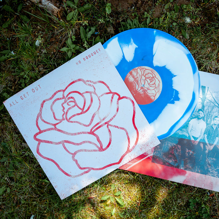 Vinyl jacket with a red rose drawn in the center. In the top left, "ALL GET OUT" is written in red font, and on the top right, "NO BOUQUET" is written in red font. peeking out of the jacket is a blue and white vinyl. They are both being laid out on grass.
