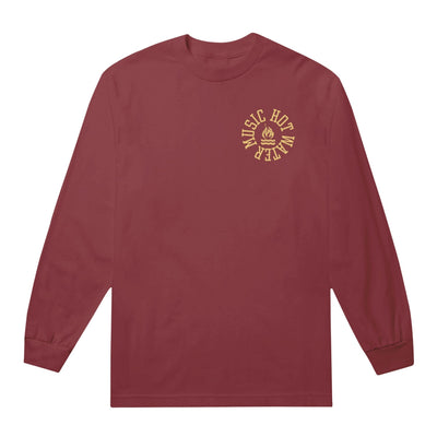 Front of red long sleeve shirt with "HOT WATER MUSIC" written in a circle surrounding a flame drawn on top of water. 