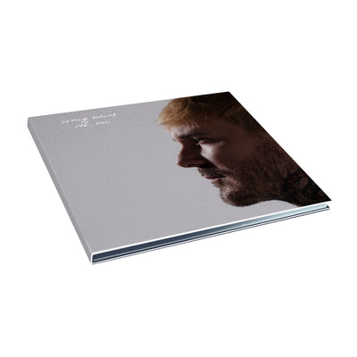 'Volume One' CD. A CD is pictured against a white background. The CD is grey, with a man's profile on the right side of it. To the left of him, in the upper corner, are the words "Craig Owens," and below it, "vol. one" in white cursive letters.