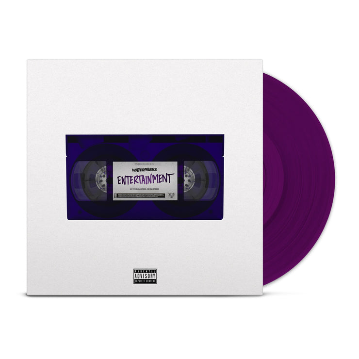 White vinyl jacket with a purple cassette tape in the center. The cassette tape has purple text on it that says ENTERTAINMENT. Peeking out of the jacket is a transparent purple vinyl. 