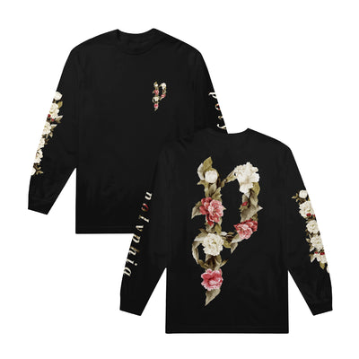 Black long sleeve shirt with the letter P written in the top right corner. The letter P is written using pink and white flowers, as well as some green leaves. The same design is on the back of the shirt, except much larger, covering the entire back. One sleeve says POLYPHIA on it, and the other has white flowers down the side.