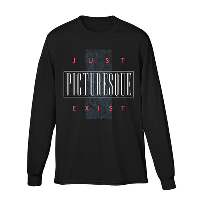 Black long sleeve shirt with white text in the center that says PICTURESQUE inside a white rectangle. On top and bottom of that is text that says JUST EXIST in red.