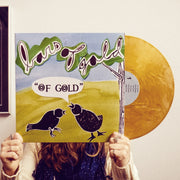 Vinyl jacket with a drawing of two black birds sitting on grass. One of them has a text box coming out of its mouth that says "of gold". There is a tree next to them with leaves that are made of the words BARS OF GOLD. The art style looks like it was cut and pasted by hand. There is a gold vinyl peeking out of the side. An individual is holding both of them and standing in front of a white wall. 